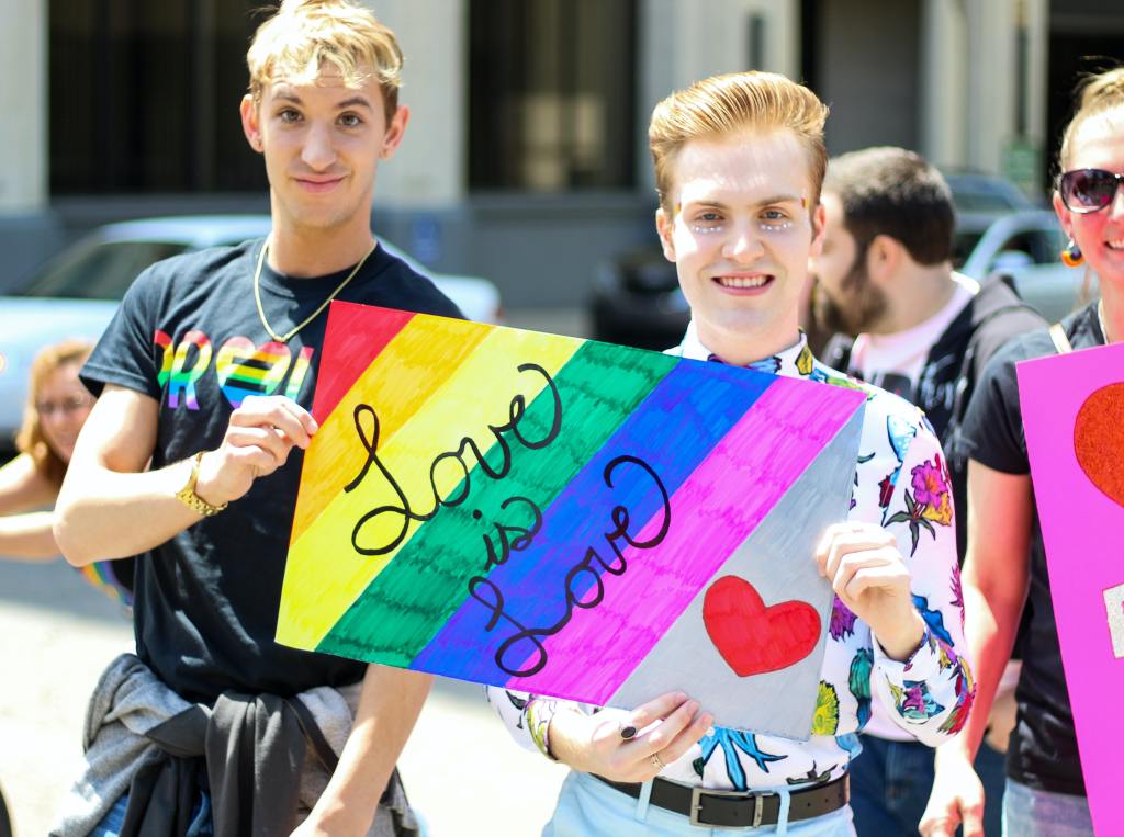 Two gay guys attending a parade